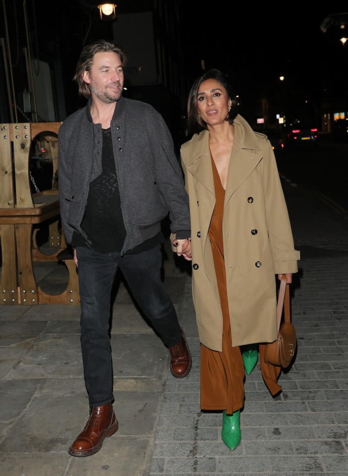Anita Rani and boyfriend walking at the Burberry London Fashion Week afterparty.
