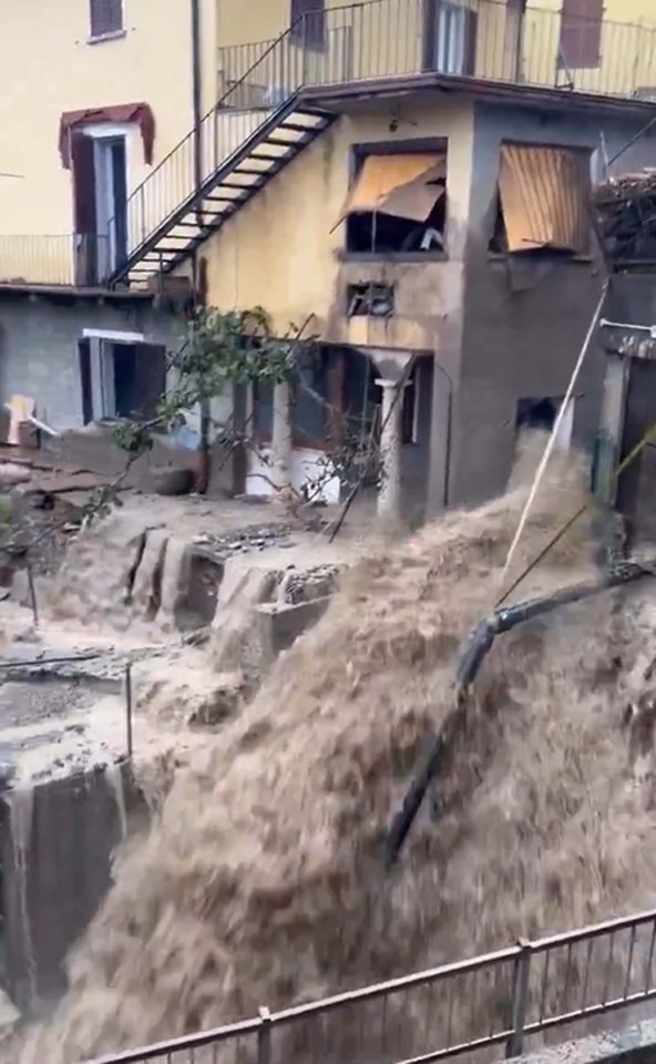 Heavy rainfall causes severe flooding that destroys homes in Blevio, Lombardy, Italy.
