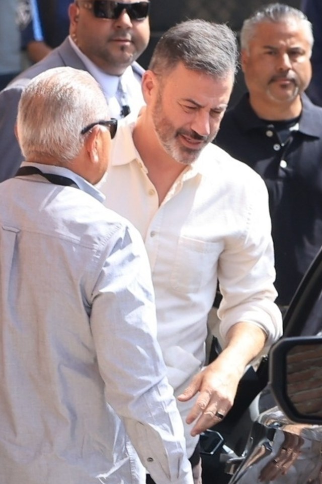 Jimmy Kimmel entering through a back door.