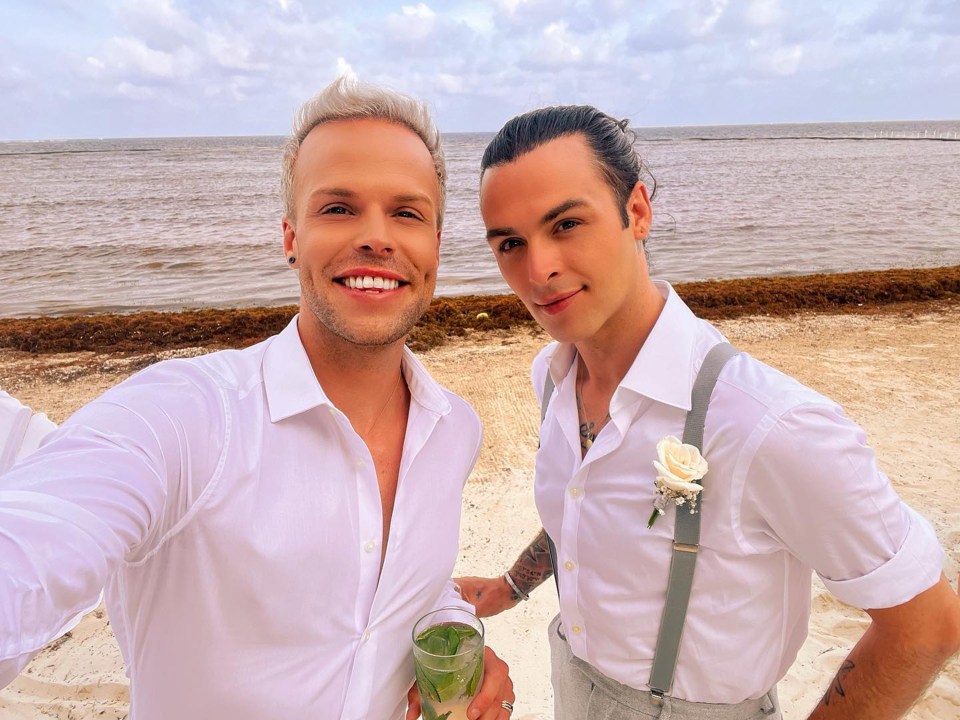 Jaymi Hensley and Olly Marmon on a beach.
