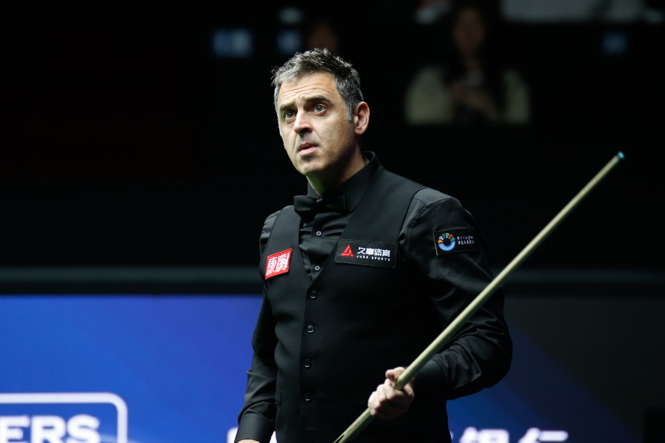 Ronnie O'Sullivan reacting during a snooker match at the 2025 Shanghai Masters.
