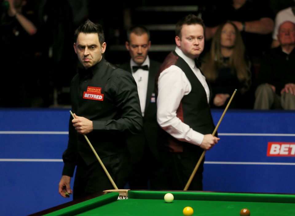Snooker players Ronnie O'Sullivan and Shaun Murphy on Day 6 of the Betfred Snooker World Championships.