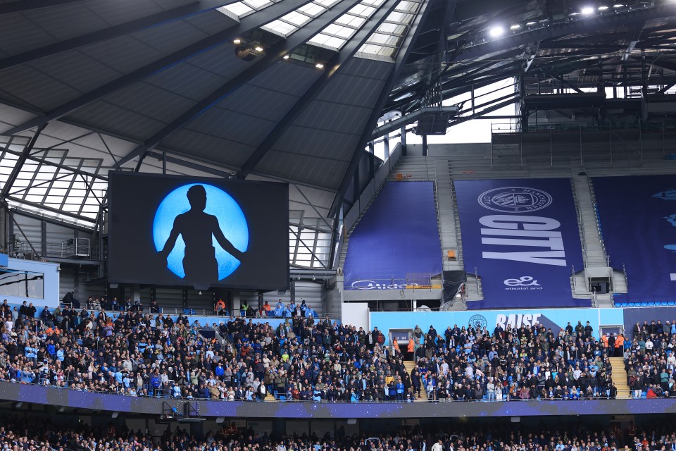 Silhouette of boxer Ricky Hatton displayed on a big screen at Etihad Stadium.