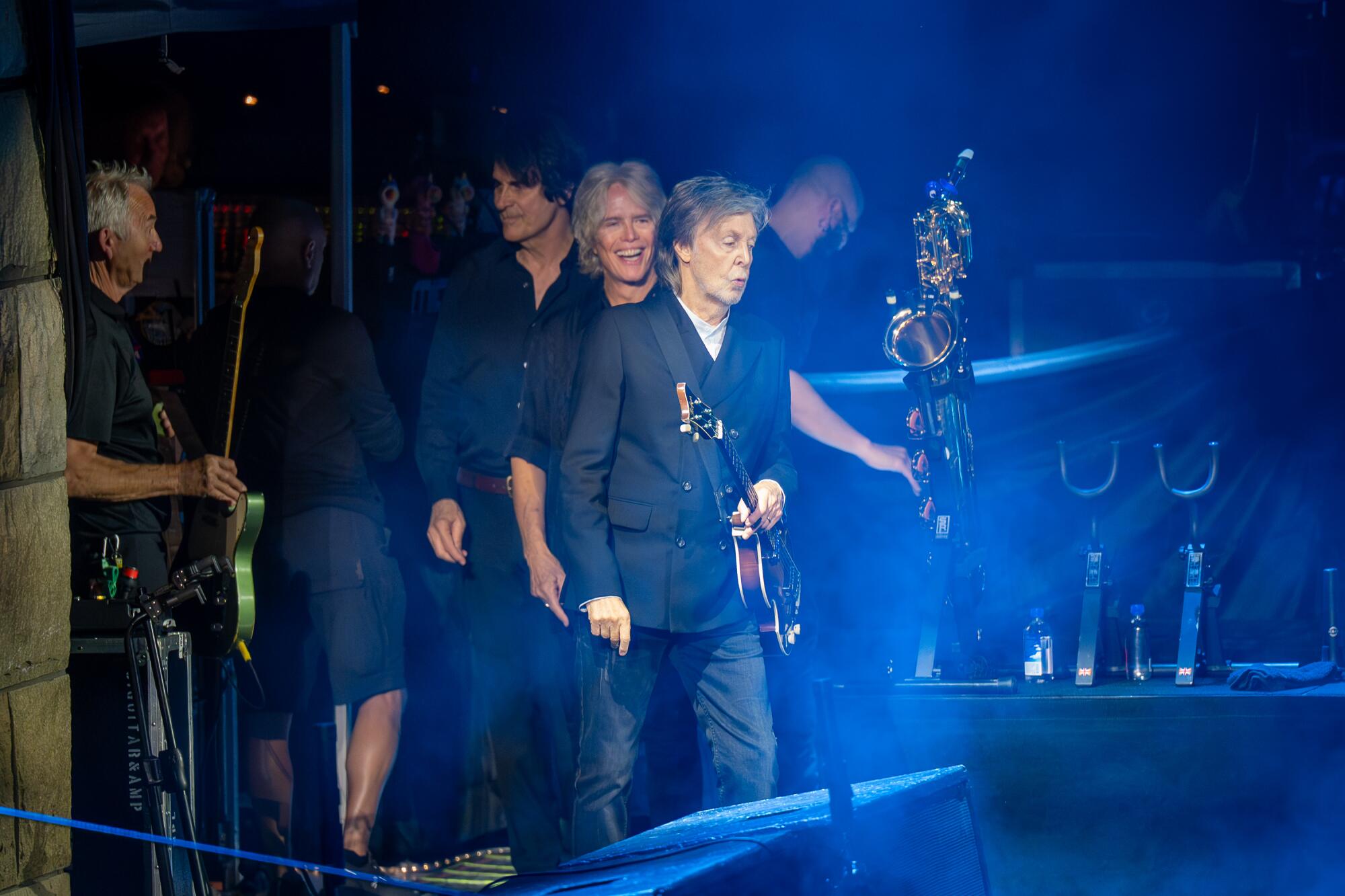 Paul McCartney takes the stage.
