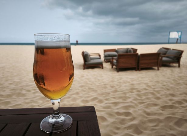 A beer glass and salt flats