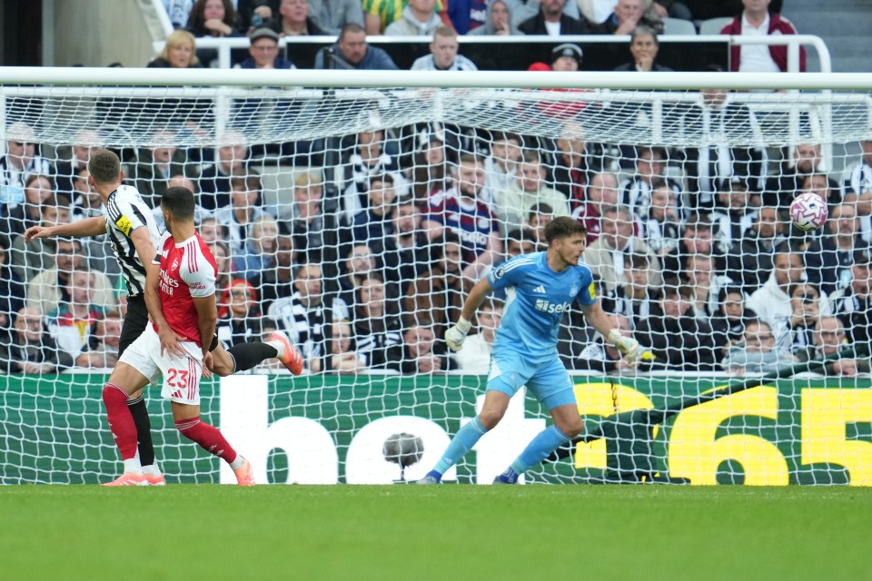 Mikel Merino, second from left, scores the opening goal for Arsenal during a soccer match.