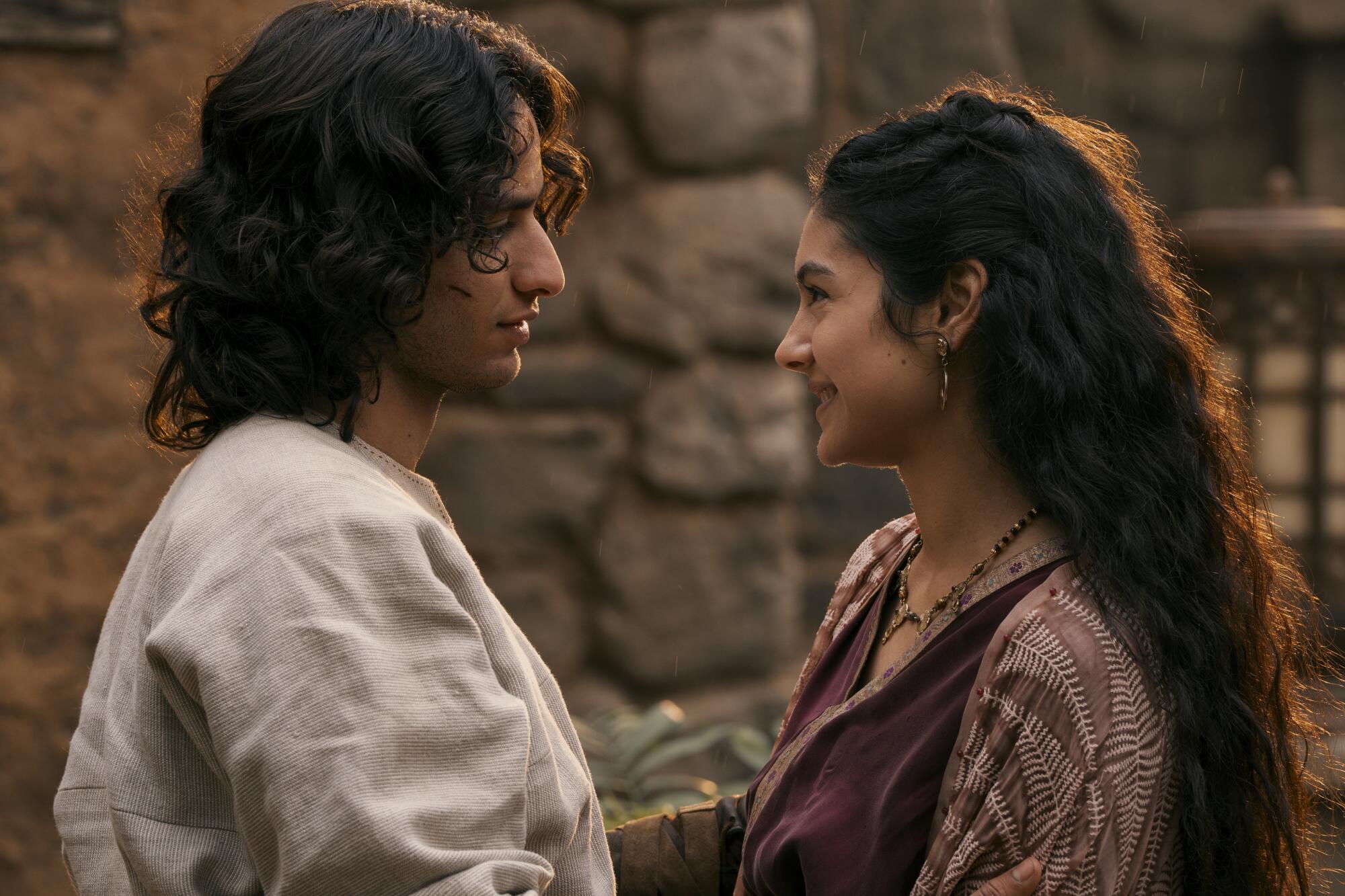 A young couple looks lovingly at each other