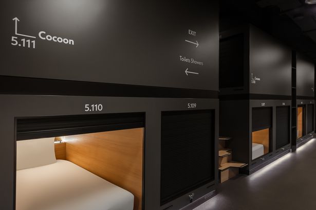 Guests sleep in 'cocoons' stacked two high
