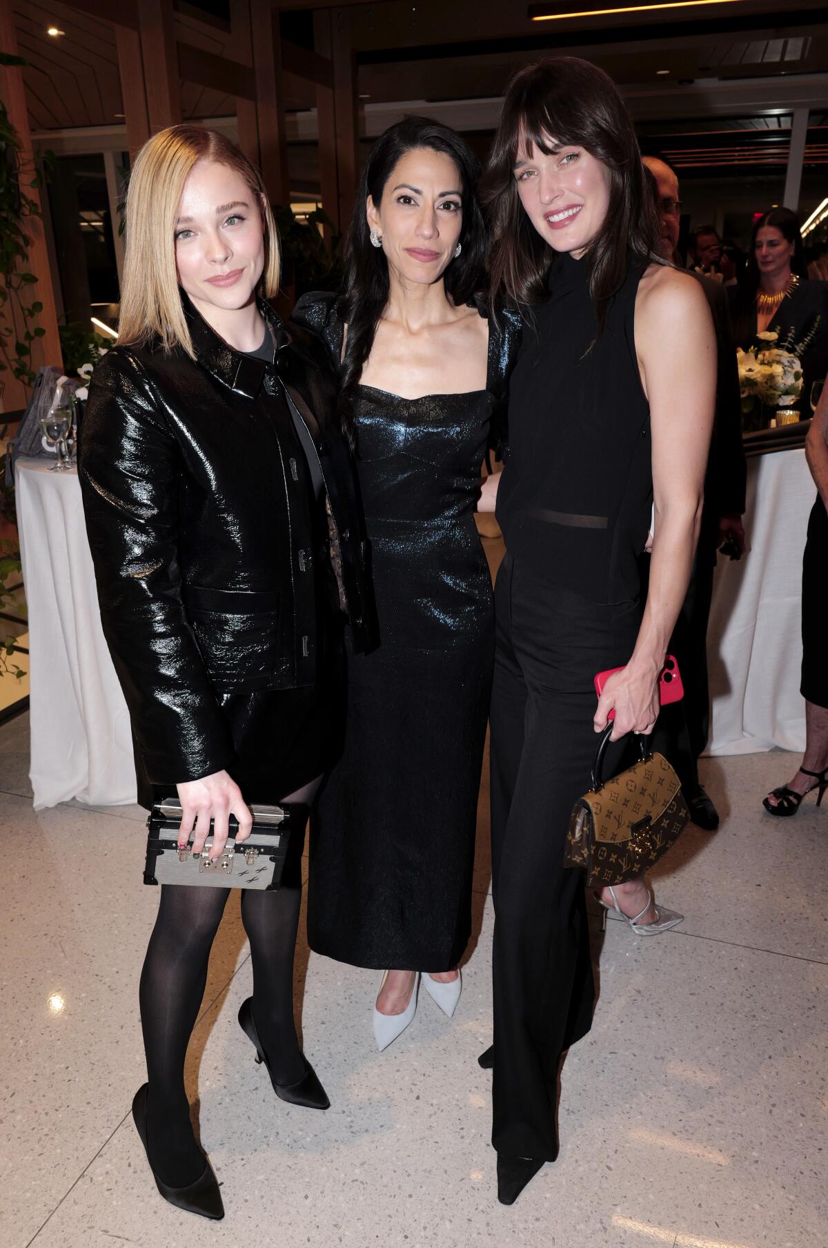 Chloë Grace Moretz, Huma Abedin, Kate Harrison at the Rockefeller Foundation