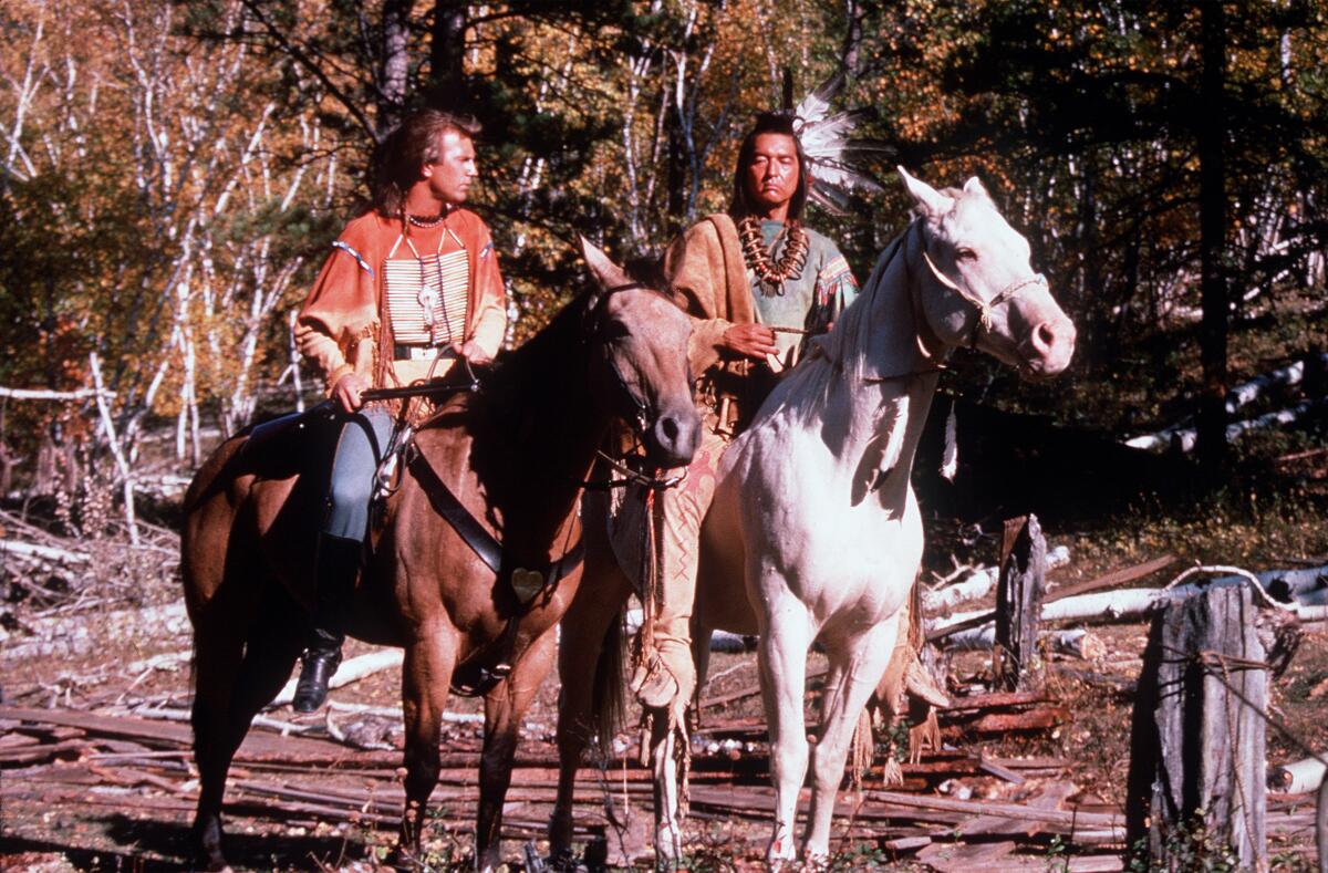 Graham Greene and Kevin Costner on horses