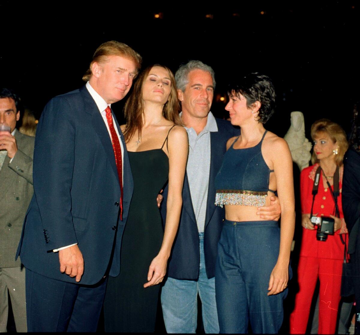 Donald Trump, future wife Melania, Jeffrey Epstein and Ghislaine Maxwell stand together.