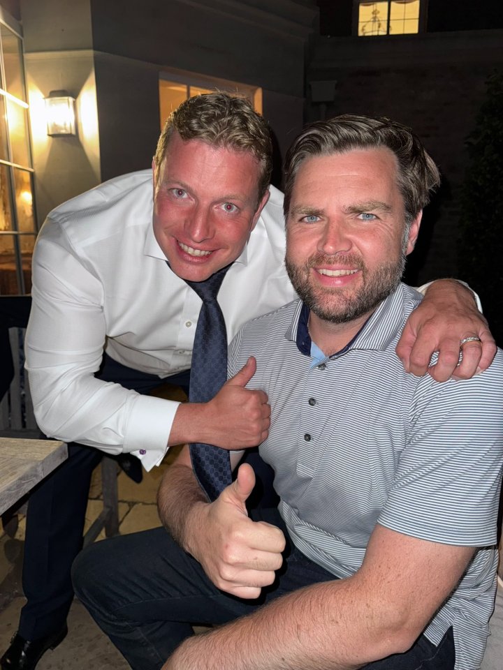 Photo of Tom Skinner and J.D. Vance giving thumbs up.