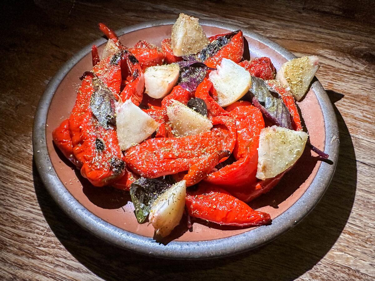 Jimmy Nardello peppers and white peaches at an August meal at Rustic Canyon in Santa Monica.