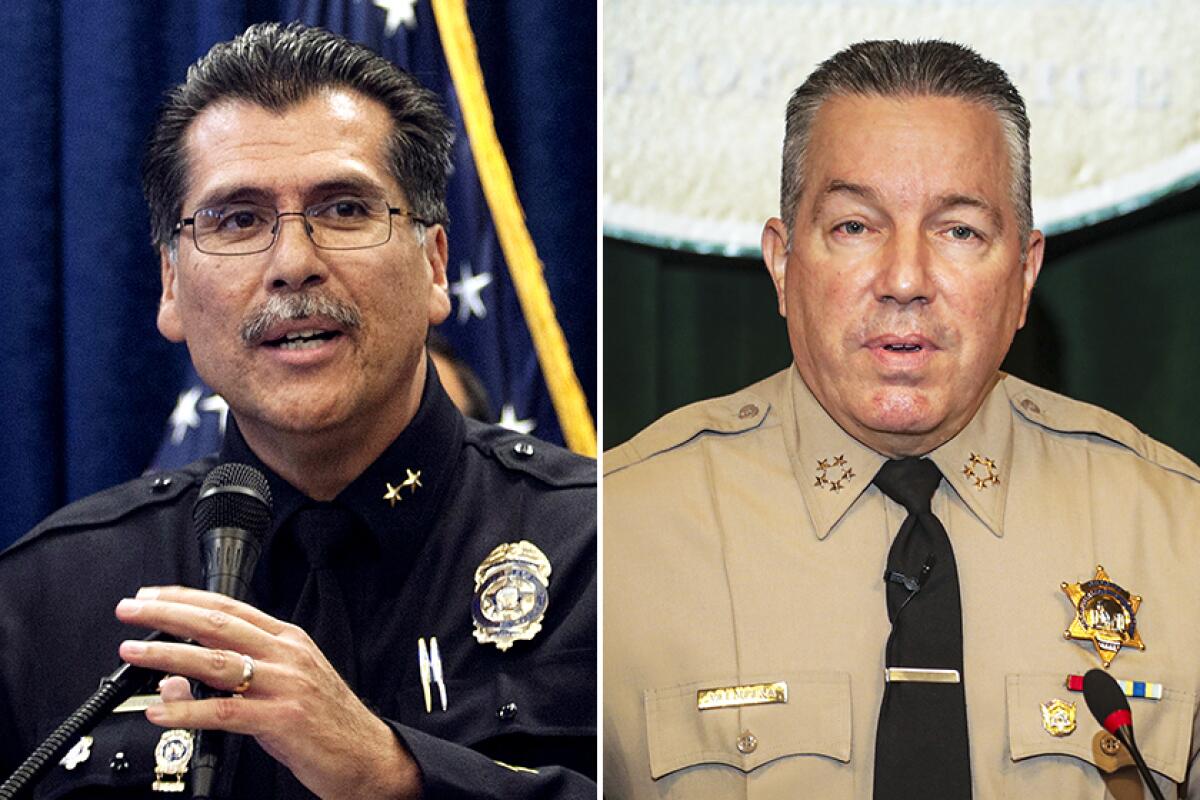 Then-retired Long Beach Police Chief Robert Luna and Los Angeles County Sheriff Alex Villanueva.