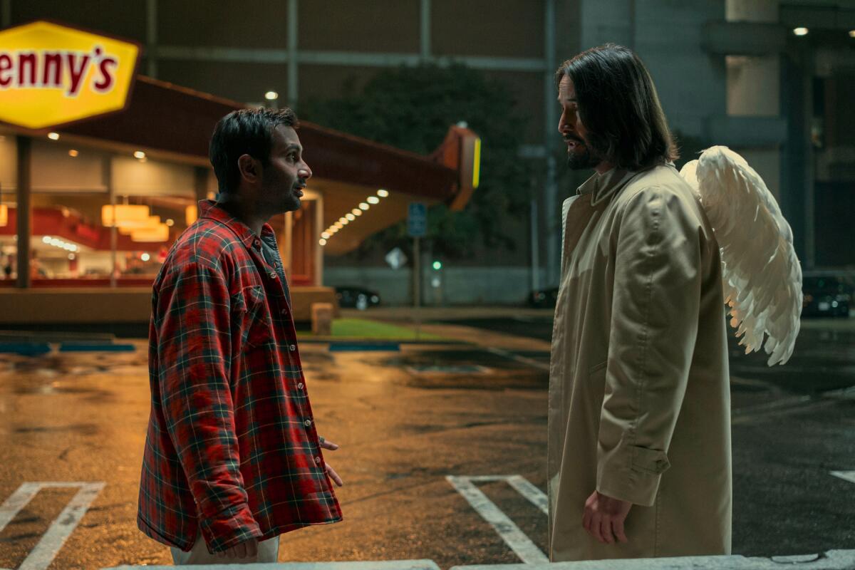Aziz Ansari, left, and Keanu Reeves in the movie "Good Fortune."