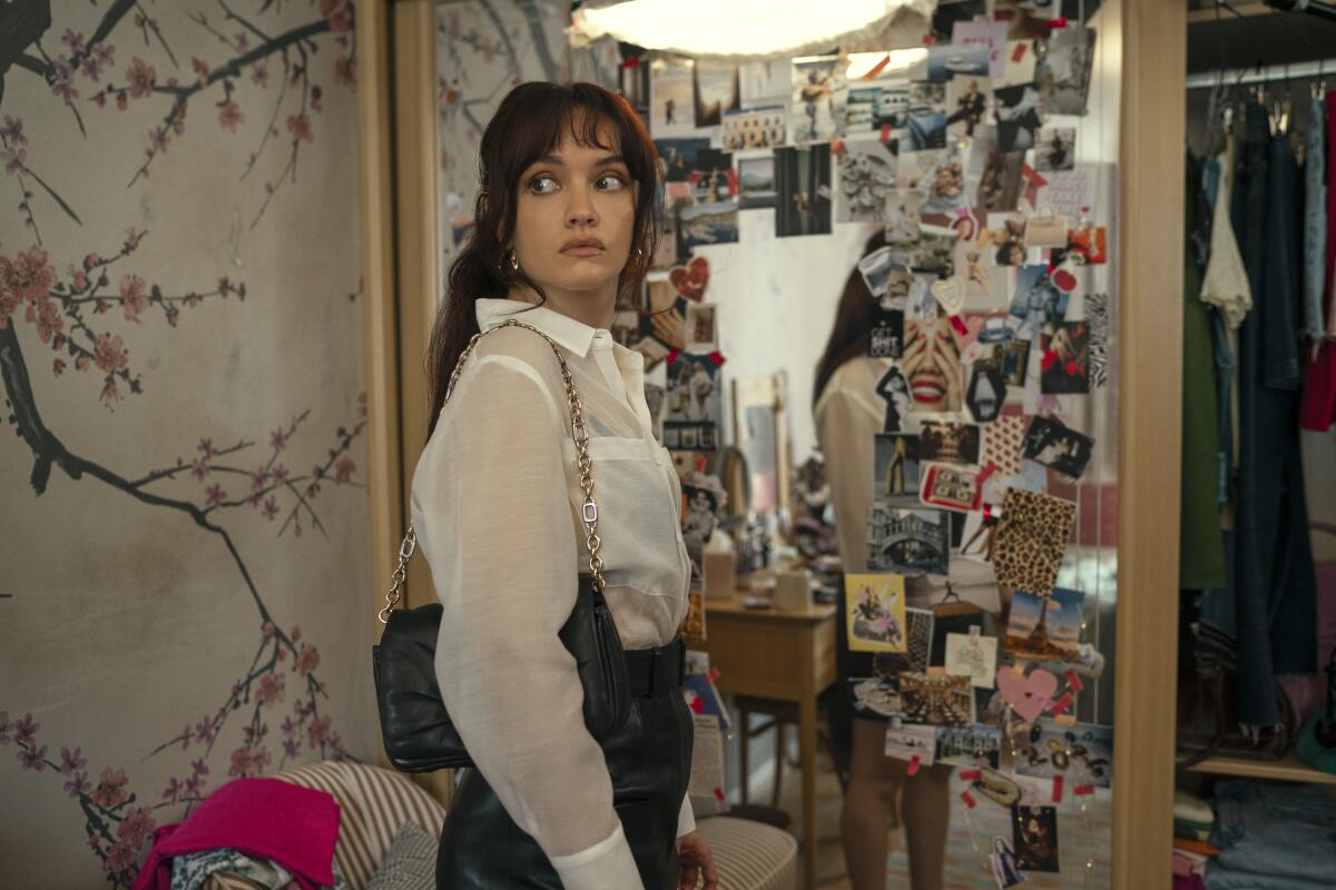 Cherry (Olivia Cooke), Daniel's working-class girlfriend.