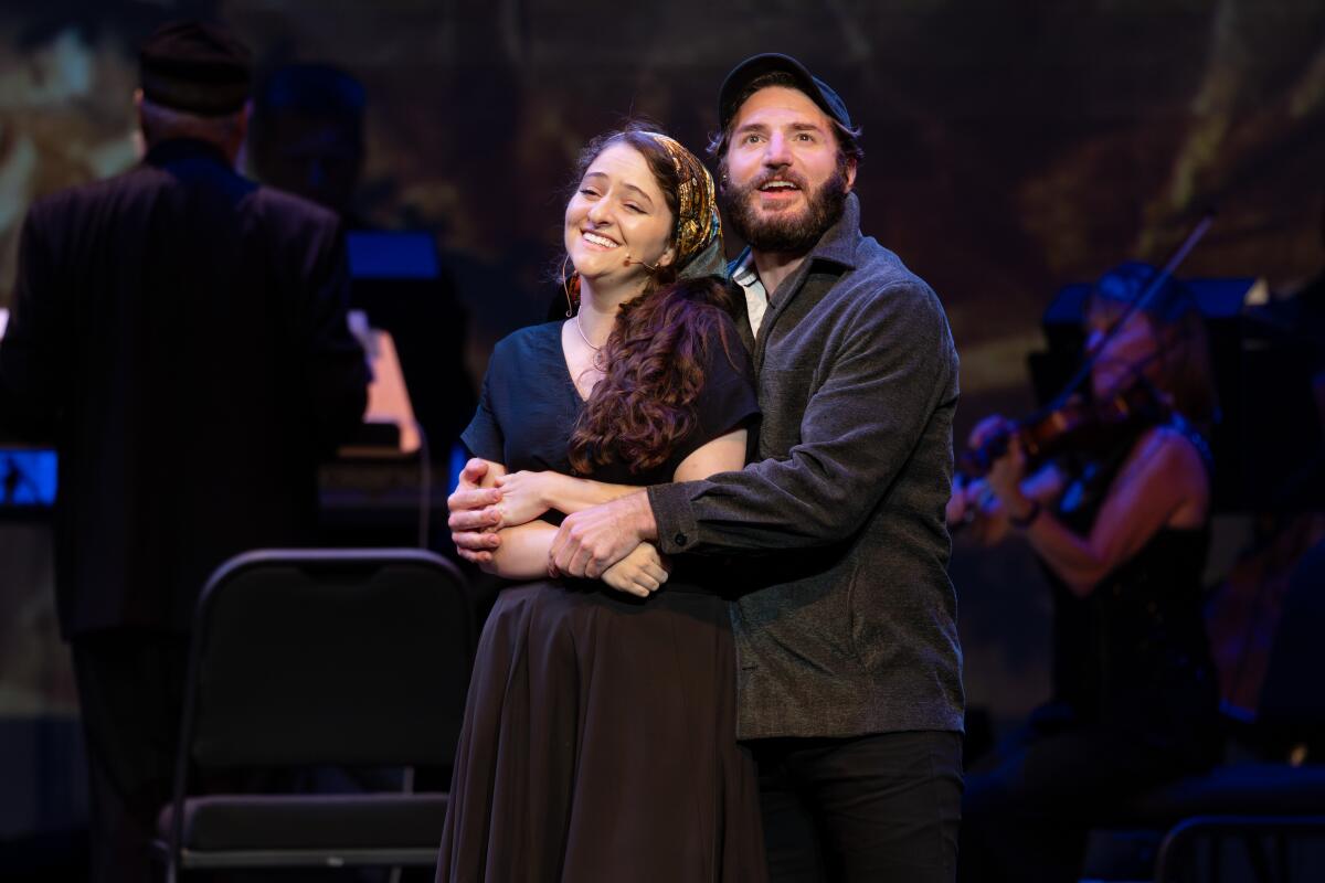 Yael Eden Chanukov (Hodl) and Drew Seigla (Pertshik) in "Fiddler on the Roof" in Yiddish at the Soraya.