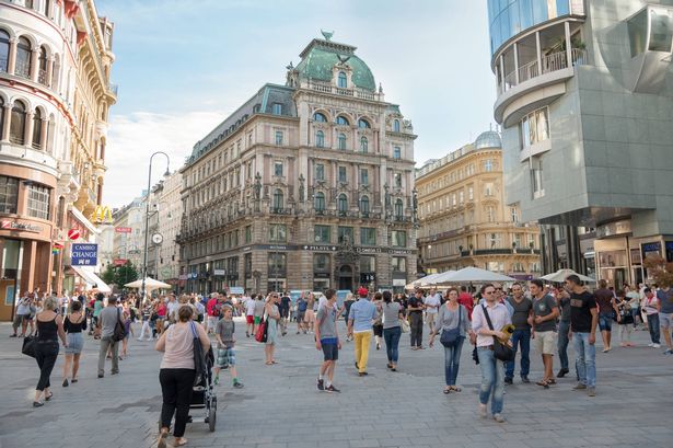 Vienna, Austria - July 31, 2015: Undefined eople walking in the historic Stephansplatz center of Vienna.