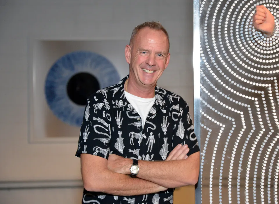 Electronic musician Fatboy Slim poses at the CXLA exhibition.