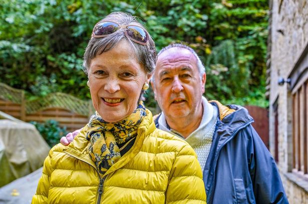 Pauline and Terry Rolls in the Cotswold village of Snowshill. // Locals in a Cotswold village which featured in the film 'Bridget Jones's Diary' have slammed strict new planning rules - which mean they'd even need permission for a patio. Snowshill appeared in the 2001 movie where its green and a local house featured as the home of the title character's parents. But as of this week the 'jewel of the Cotswolds' will come under an Article 4 Direction by Tewkesbury Borough Council - strict laws rules to protect its heritage. It means virtually any work or alterations to buildings must be cleared by the authority - such as putting in patios or changing the colour of an exterior wall.