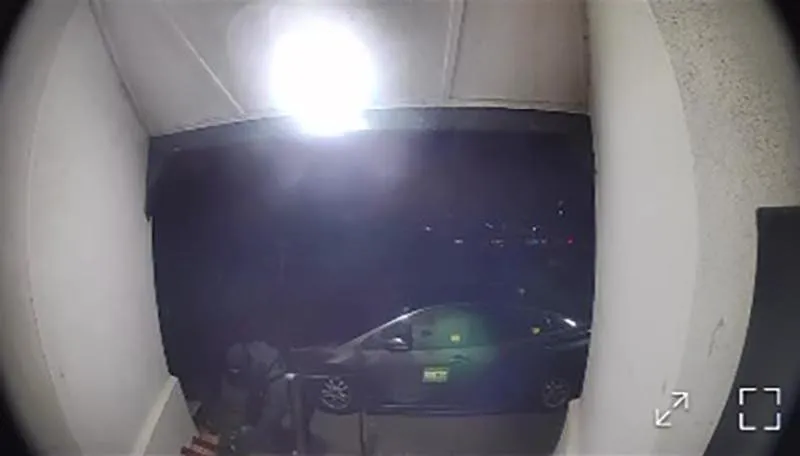 Security camera footage of a person appearing to set an arson attack at Peachaven Mosque.