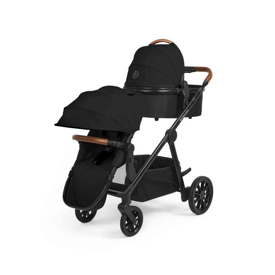 Black Virgo Travel System with two seats and an adjustable bassinet.