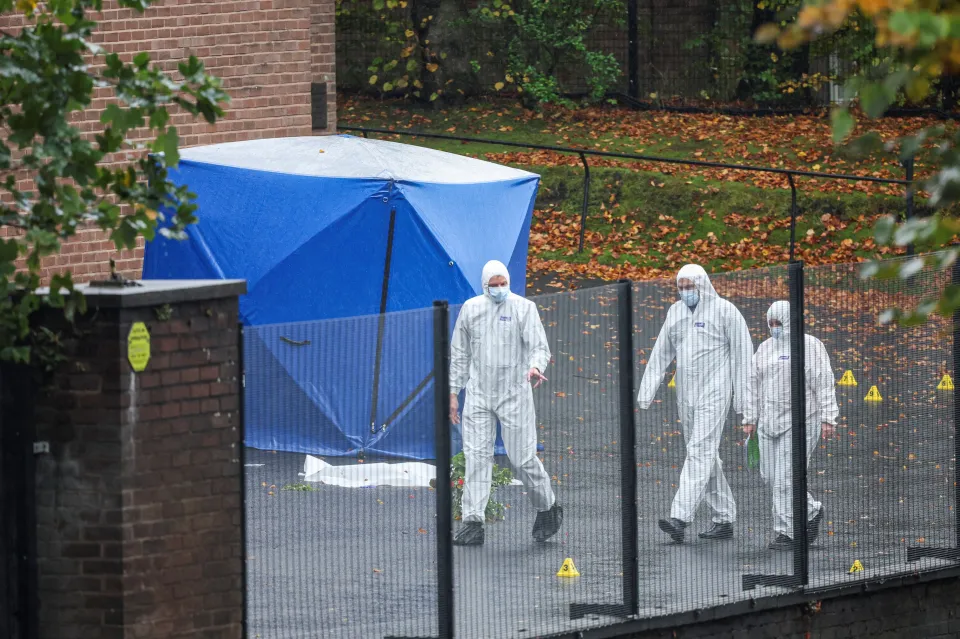 Members of a forensic team work outside the Manchester synagogue, where multiple people were killed on Yom Kippur in what police have declared a terrorist incident, in north Manchester, Britain.