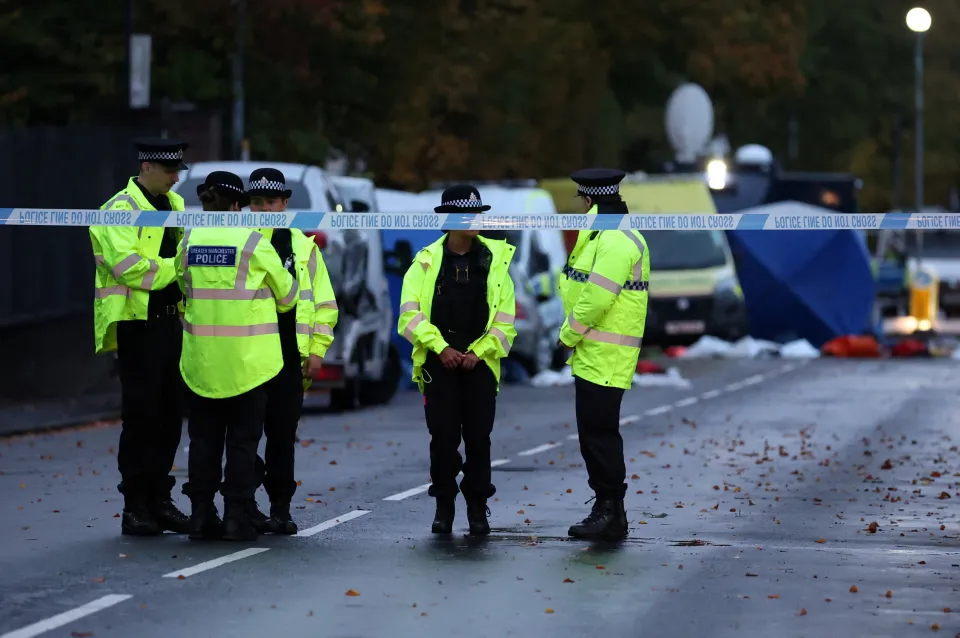 Police officers stand guard at the cordon outside the Manchester synagogue where a terrorist incident occurred.