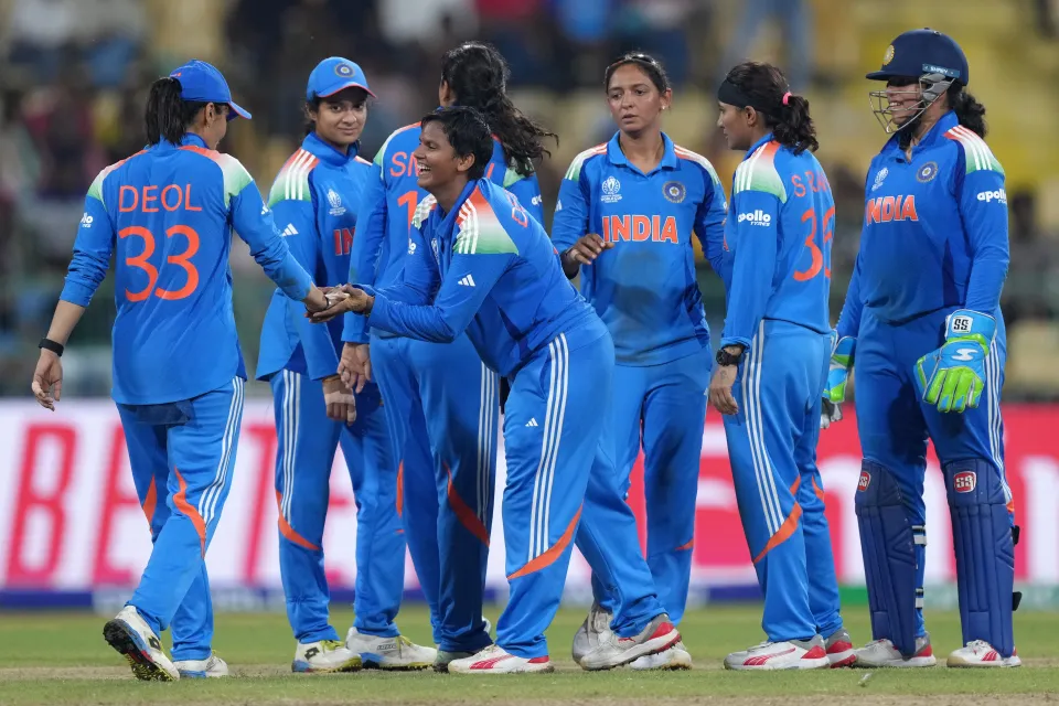 Deepti Sharma of India is congratulated by team mate Harleen Deol after taking a wicket during the ICC Women's Cricket World Cup match between India and Pakistan.