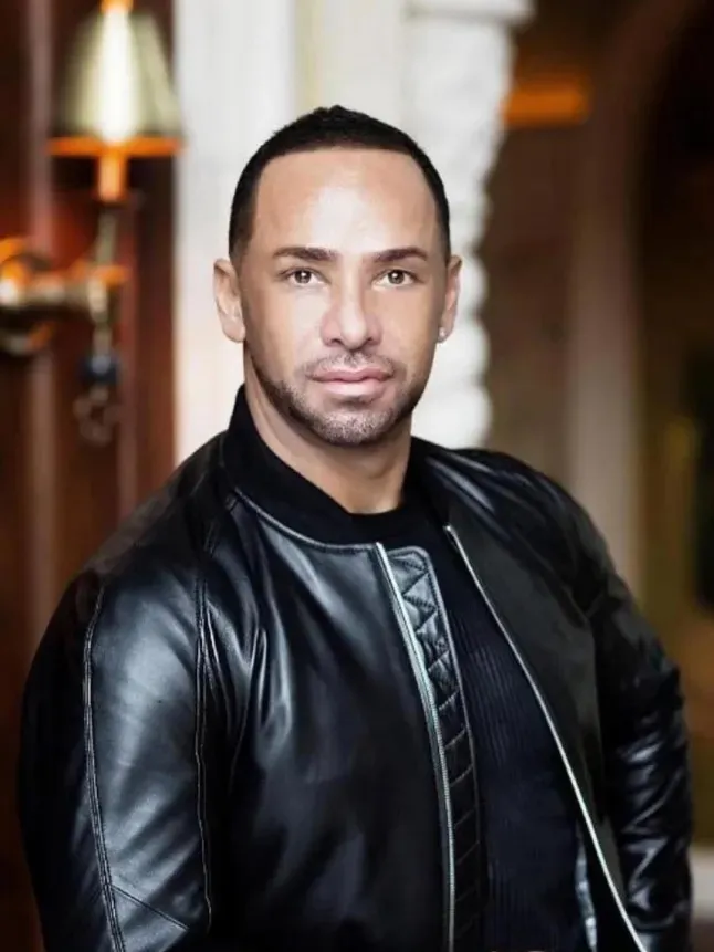 Michael Wentink wearing a black leather jacket.