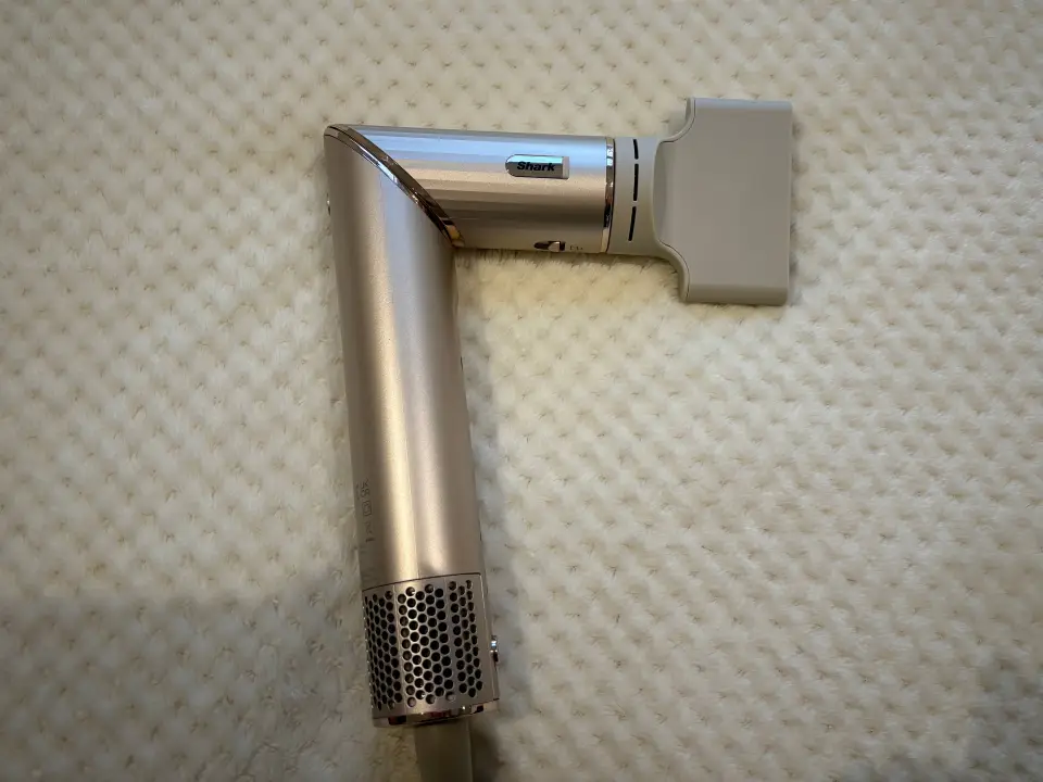 Shark hair dryer with styling concentrator attachment.