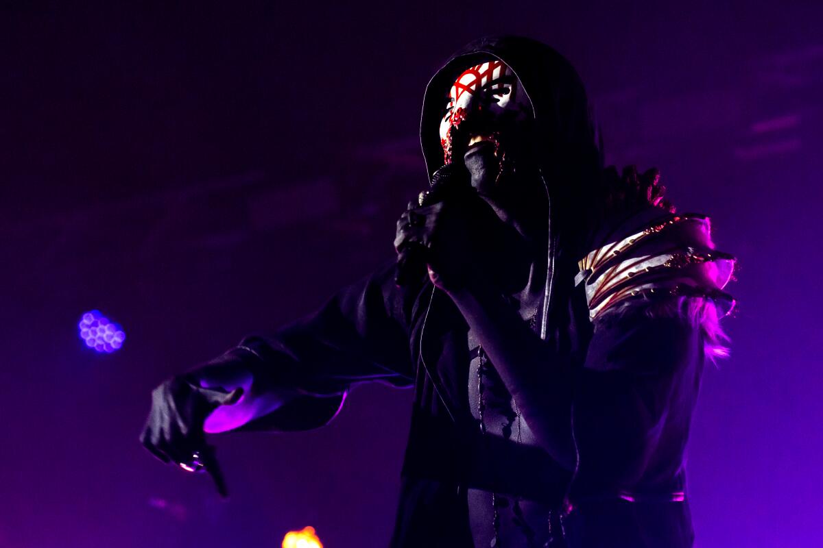 Sleep Token performs at the Reading Music Festival, England, in 2023.