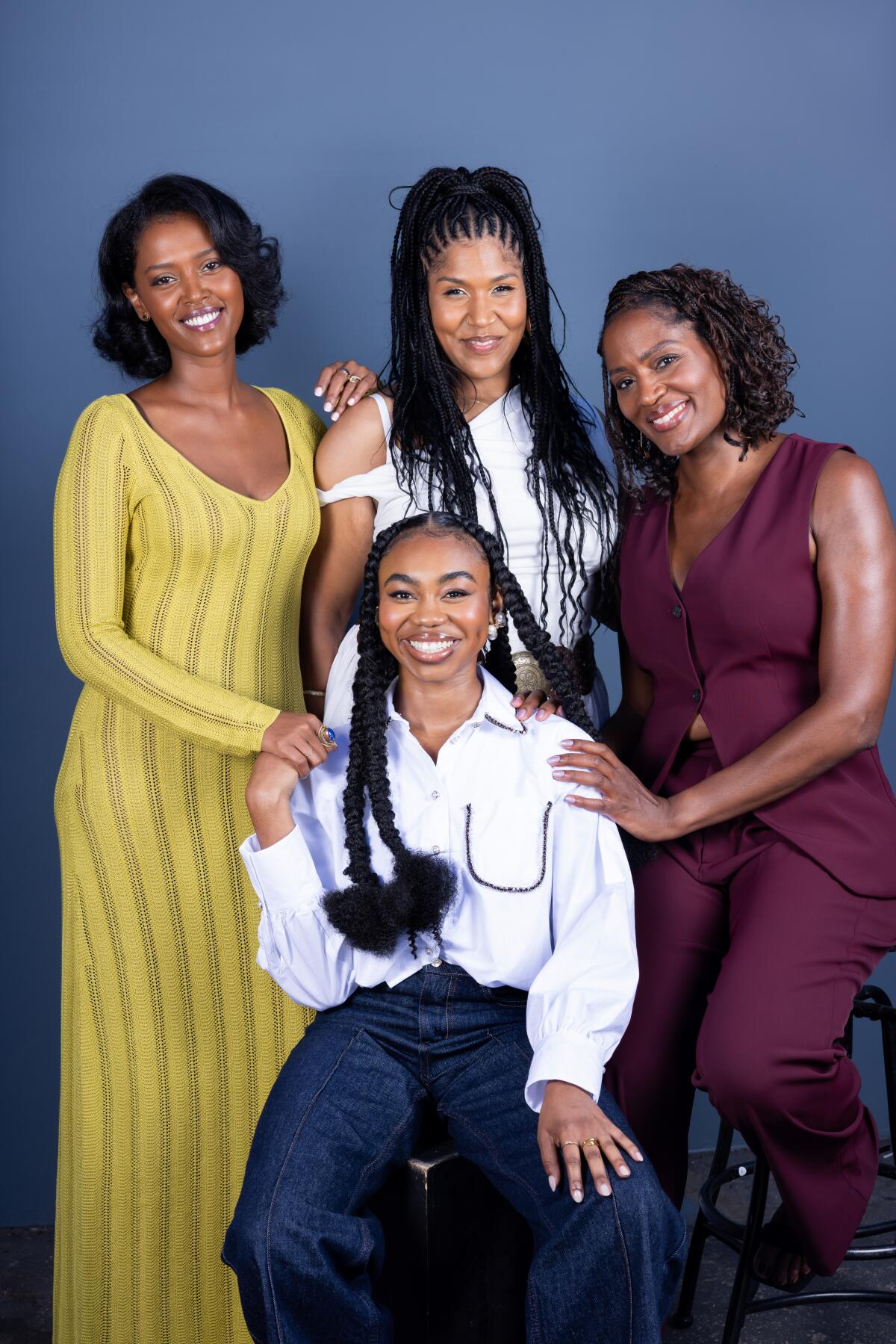 Bisserat Tseggai, Claudia Logan, Victoire Charles, and Jordan Rice, of "Jaja's African Hair Braiding."