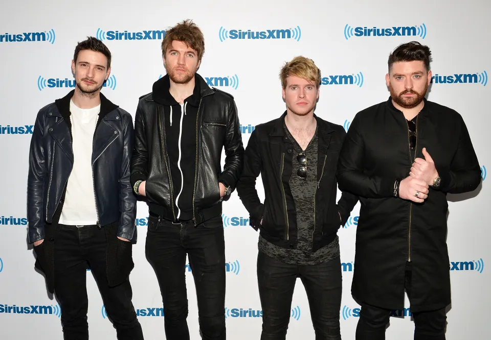 Kodaline members Jason Boland, Mark Prendergast, Steve Garrigan, and Vinny May posing at SiriusXM Studios.