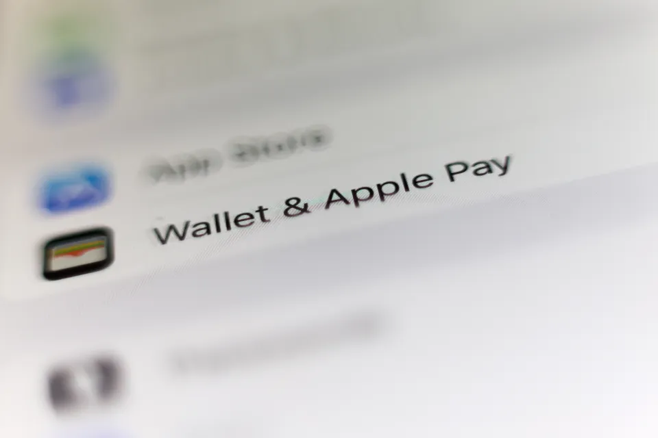 Wallet and Apple Pay icon displayed on a phone screen.