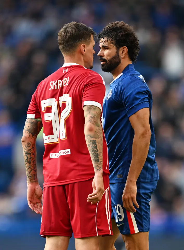 Martin Skrtel of Liverpool Legends and Diego Costa of Chelsea Legends face off.