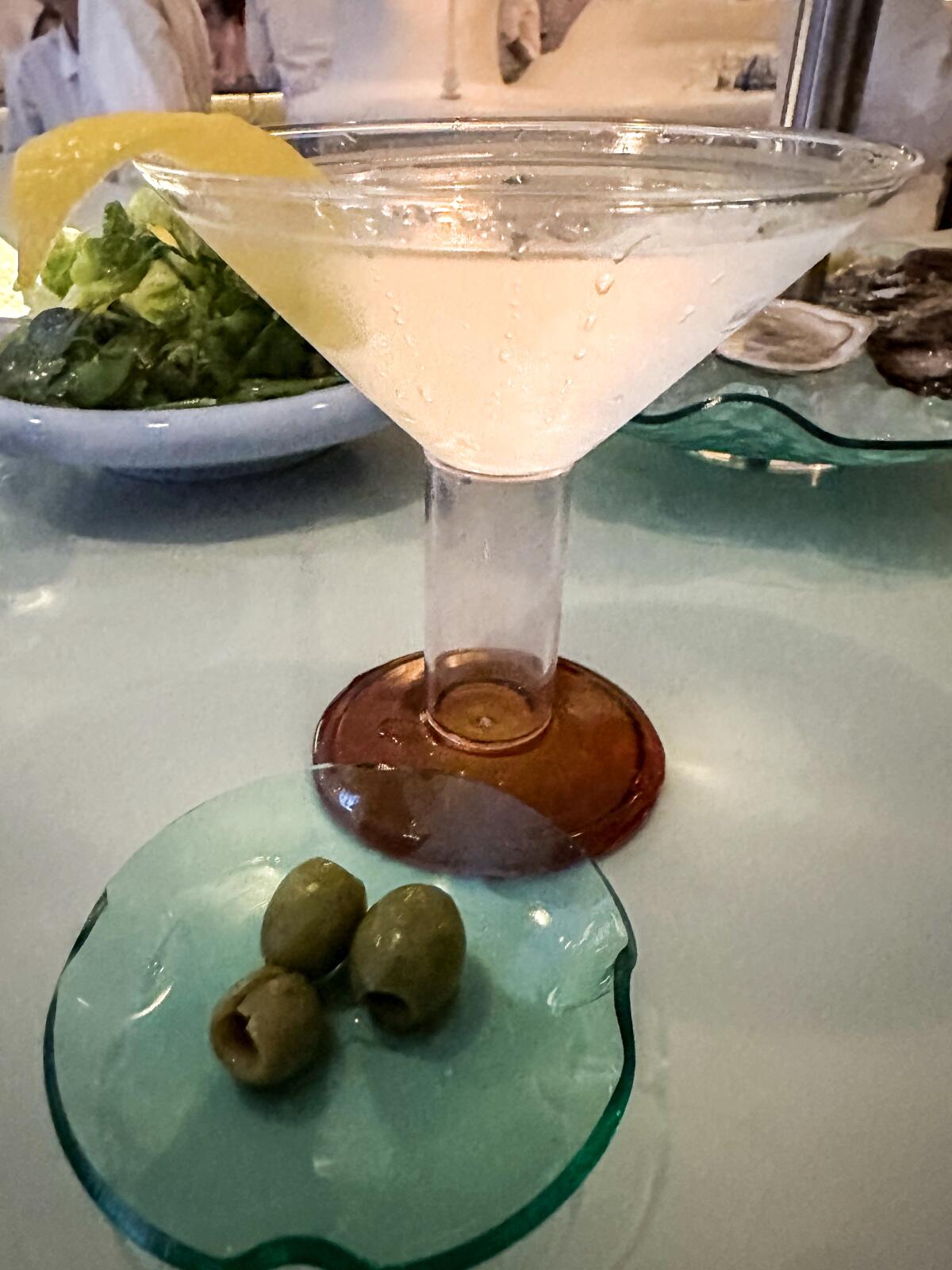 A martini at the bar of Cento Raw Bar.