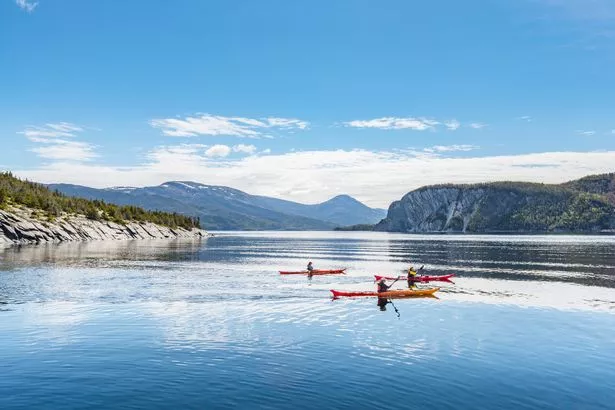 Kayaks in Norris Cove of Norris Point, NF Canada.