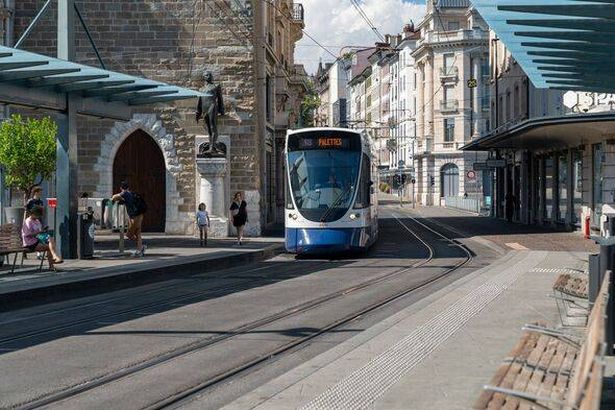 Lightrail tram train pulls into a station in Geneva, by TPG