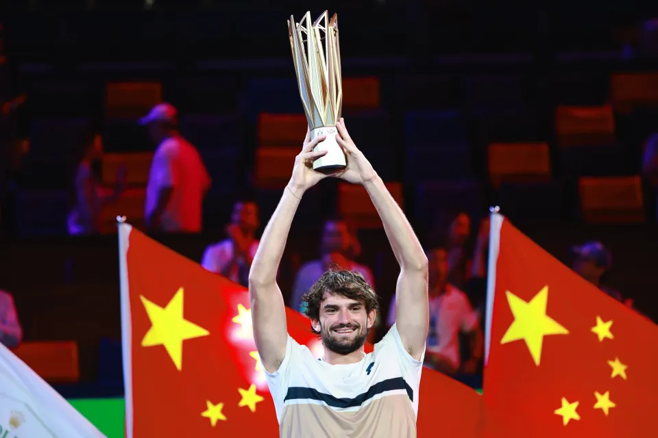 Valentin Vacherot of Monaco poses with his trophy after winning the men's singles final match at the Shanghai Masters tennis tournament.