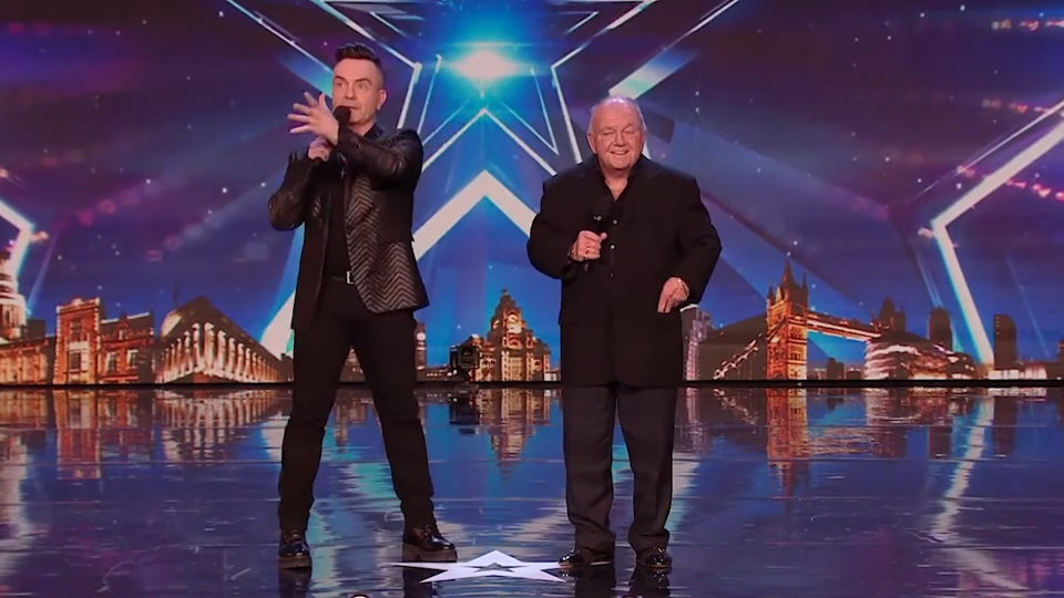 An older man smiling on stage during his Britain's Got Talent audition.
