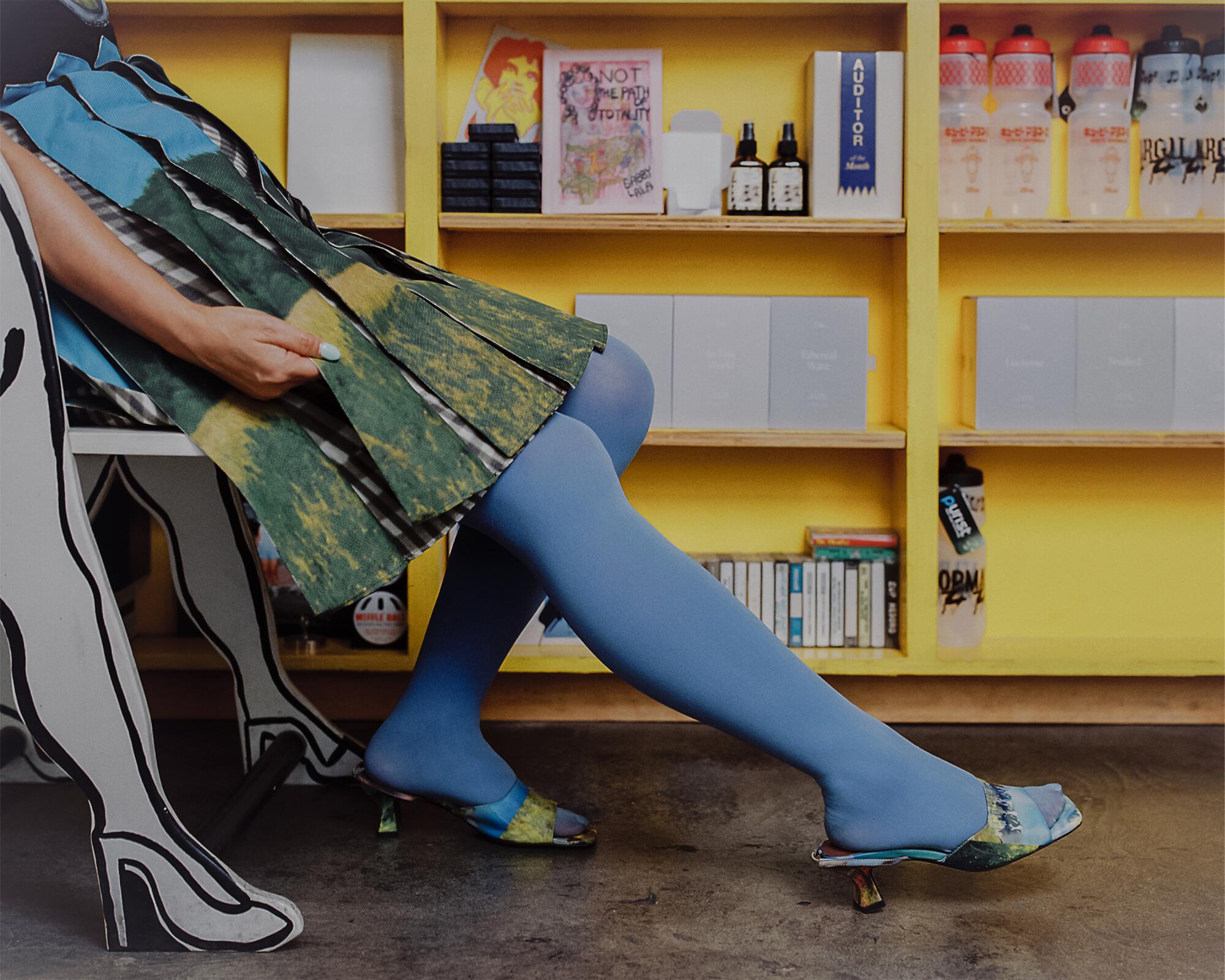 Shirley wears Leeann Huang shoes, and We Love Colors tights.