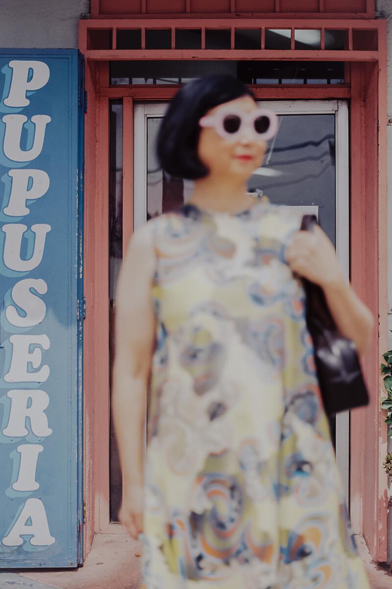 Shirley wears Leeann Huang lenticular dress, and l.a. Eyeworks sunglasses.