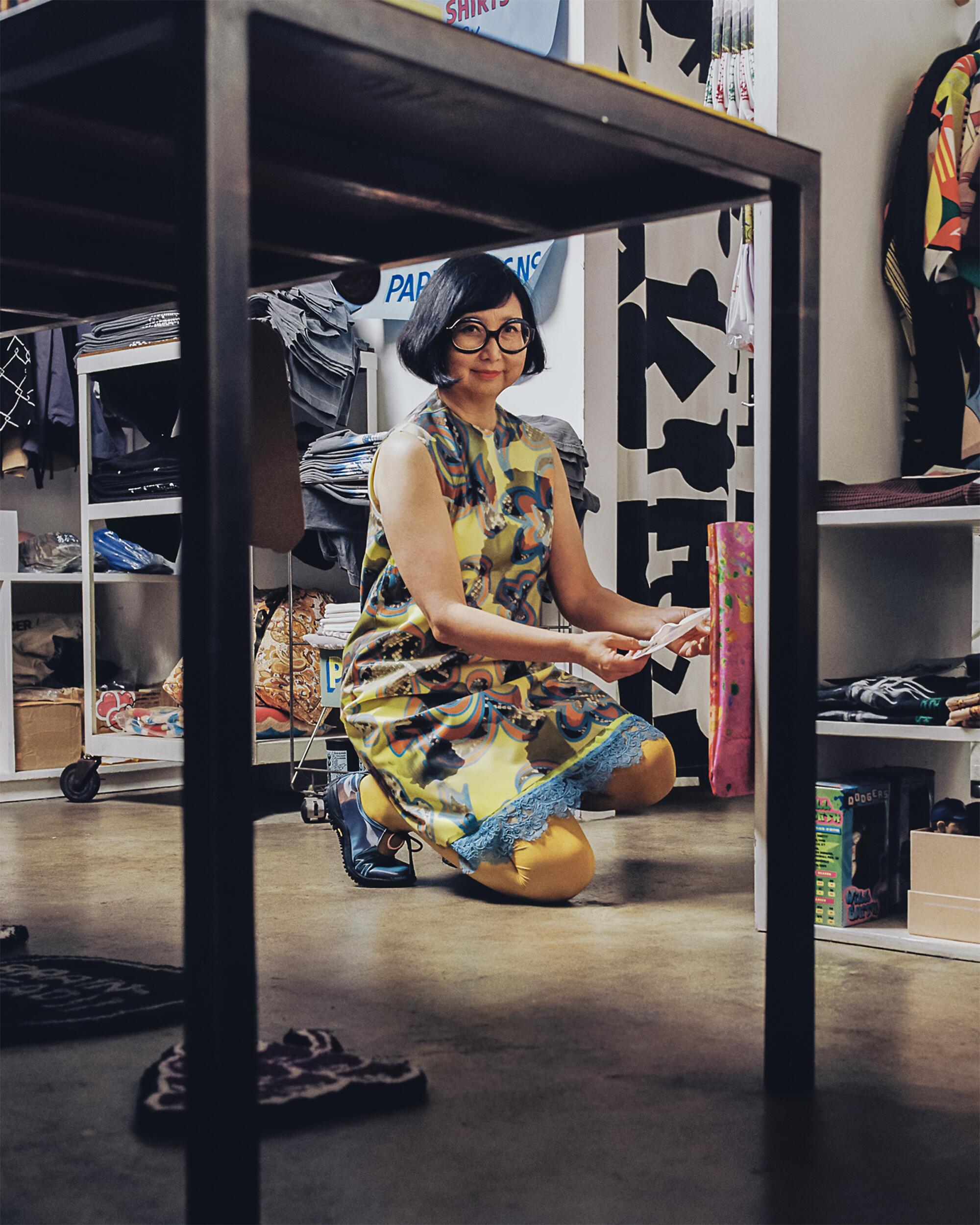 Shirley wears Leeann Huang lenticular dress and shoes, Mary Quant tights and l.a. Eyeworks sunglasses.