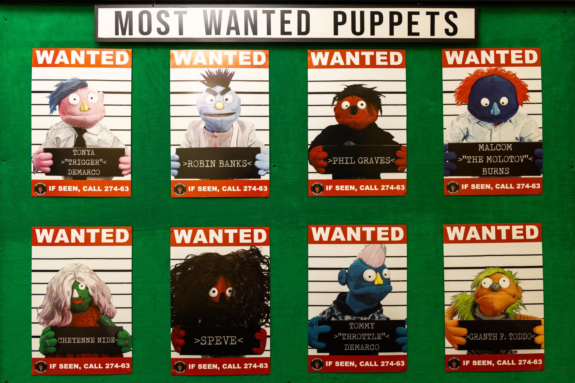 Wanted posters for puppets. Many are a suspect in Appleseed Avenue's "Election Day."