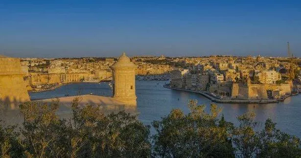 Three Cities from Valletta, Malta at sunset