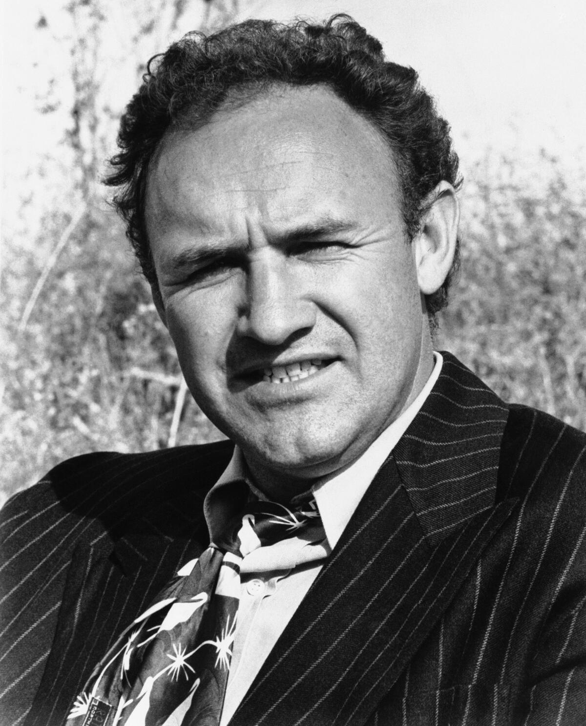 Gene Hackman co-stars in "Bonnie and Clyde," alongside  Warren Beatty and Faye Dunaway.