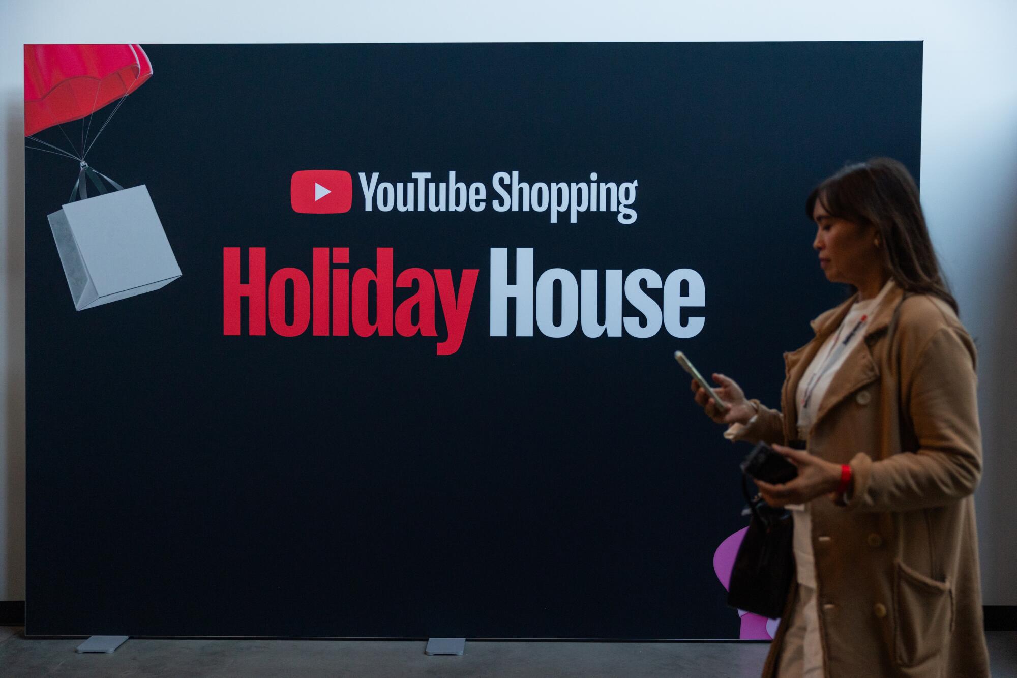 A YouTube content creator who declined to give her name browses YouTube's Holiday House shopping event.