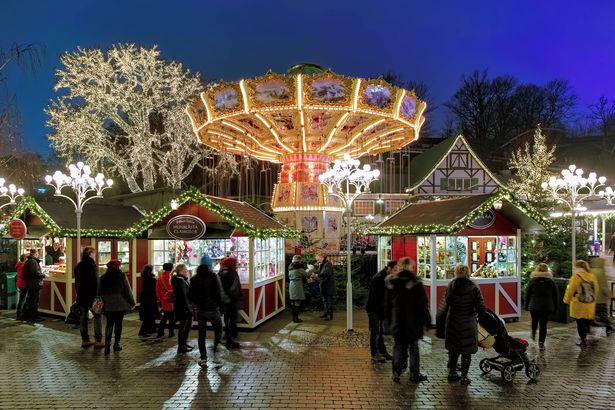 Gothenburg, Sweden - Decamber 17, 2015: Christmas Market with Carousel in Liseberg park. Liseberg is one of the most visited amusement parks in Scandinavia and the most famous Christmas Market of Sweden.