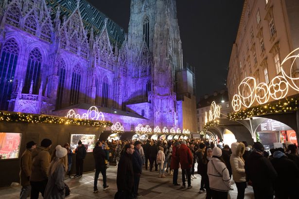 VIENNA, AUSTRIA - 2024/11/11: People enjoy a Christmas market in Stephansplatz (St. Stephen's Square). (Photo by Marcos del Mazo/LightRocket via Getty Images)